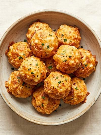 Air Fryer Cheddar-Mozzarella Cheese Bombs with Garlic Herb Butter