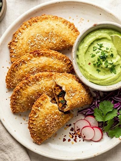 Air Fryer Coconut Empanadas with Chipotle Tofu & Avocado-Lime Crema