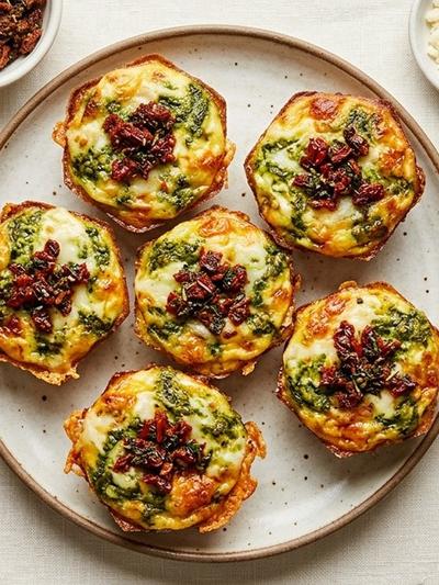 Air Fryer Provolone Pesto Egg Muffins with Sun-Dried Tomato Crumble